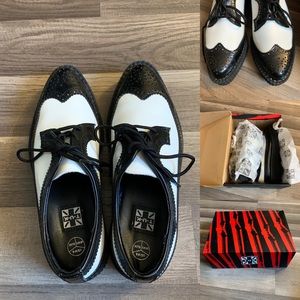 T.U.K. BLACK AND WHITE WINGTIP CREEPER SIZE 6M 8W